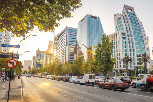Apoquindo Avenue and modern buildings of Las Condes neighborhood at sunset - Santiago, Chile