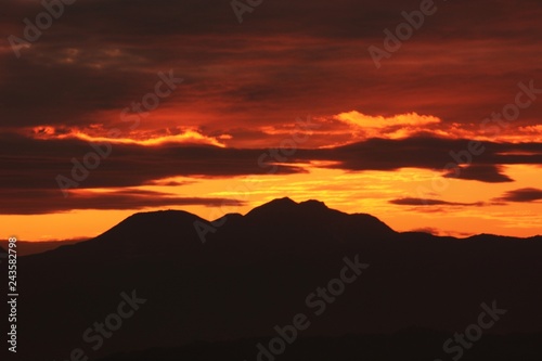 Afterglow of the sunset and silhouette of the mountains