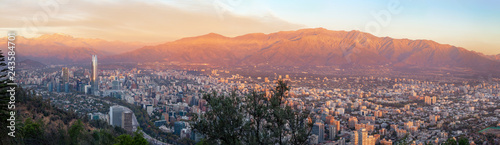 Panoramic aerial view of Santiago skyline at sunset with Andes Mountains - Santiago, Chile © diegograndi
