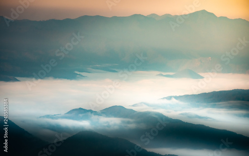 Fototapeta Naklejka Na Ścianę i Meble -  Morning fresh air on a high mountain peak with a new morning sunrise