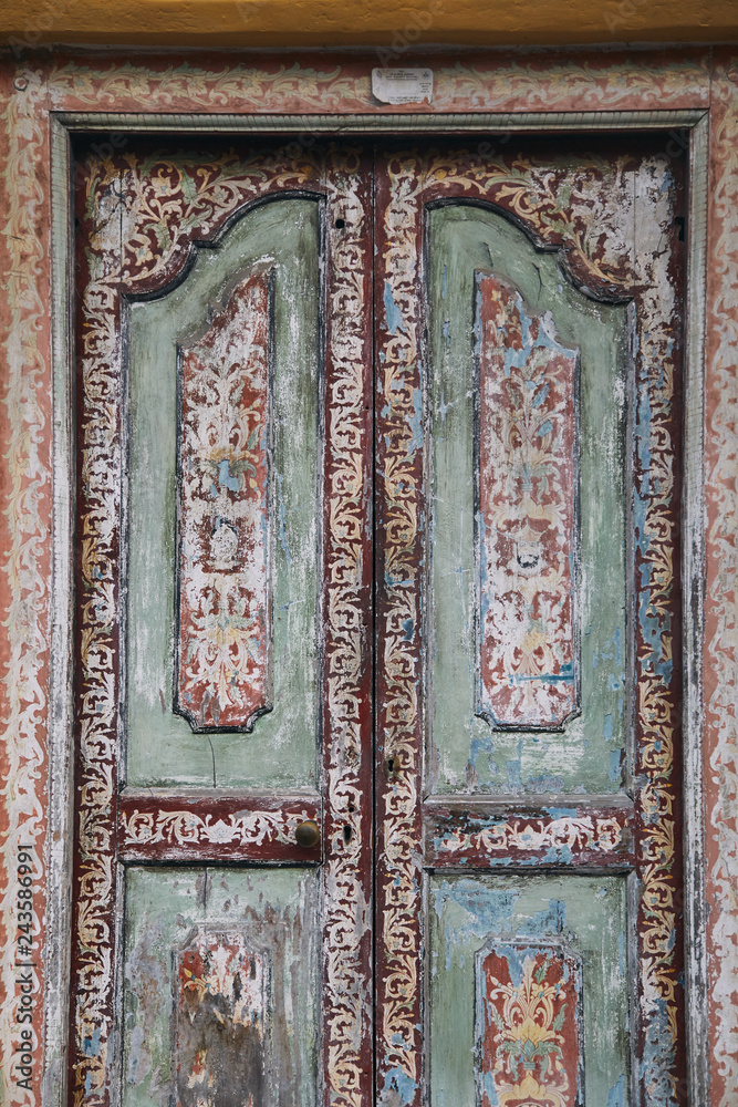 old shabby wooden door. Close up. Texture. Galle, Sri Lanka