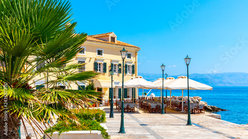 Restaurant on the sea coast in the Kerkyra historic centre, Corfu town, Greece photo
