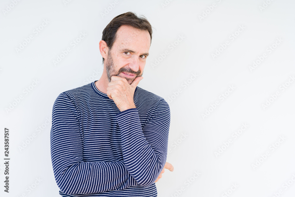 Handsome senior man over isolated background looking confident at the camera with smile with crossed arms and hand raised on chin. Thinking positive. Handsome senior man over isolated background looking confident at the camera with smile with crossed arms and hand raised on chin. Thinking positive.