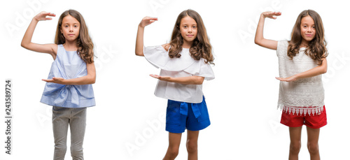 Collage of hispanic young child over isolated background gesturing with hands showing big and large size sign, measure symbol. Smiling looking at the camera. Measuring concept.