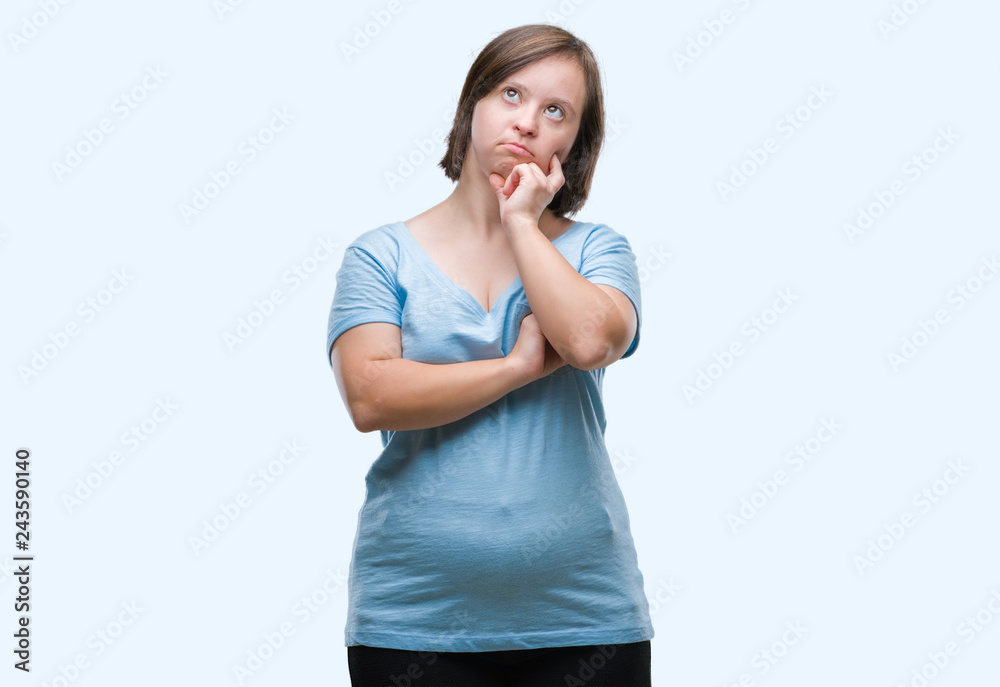 Young adult woman with down syndrome over isolated background thinking looking tired and bored with depression problems with crossed arms. Young adult woman with down syndrome over isolated background thinking looking tired and bored with depression problems with crossed arms.