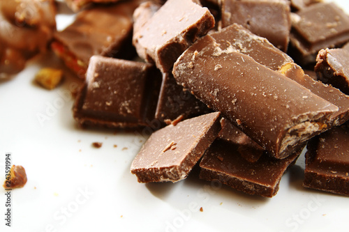 Chocolate background   Chocolate is a usually sweet  brown food preparation of roasted and ground cacao seeds