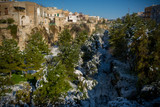 Horizontal View of the Gravina of the Town of Massafra, Covered by Snow on Blue Sky Background