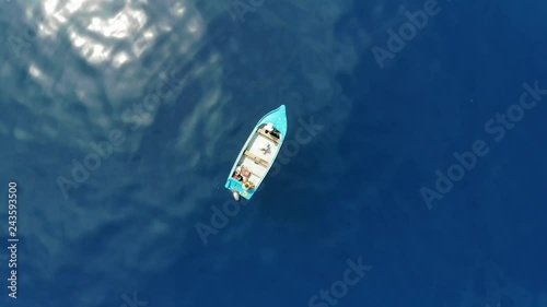 Aerial of fisherman on boat photo