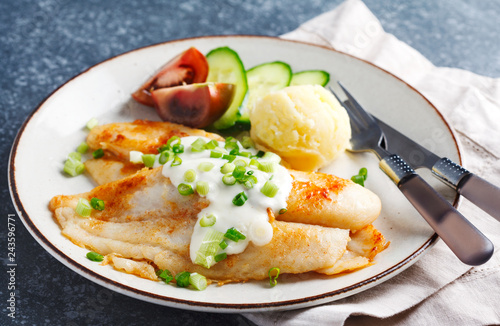 Fried Basa Fillet with sauce, mashed potato and fresh vegetables