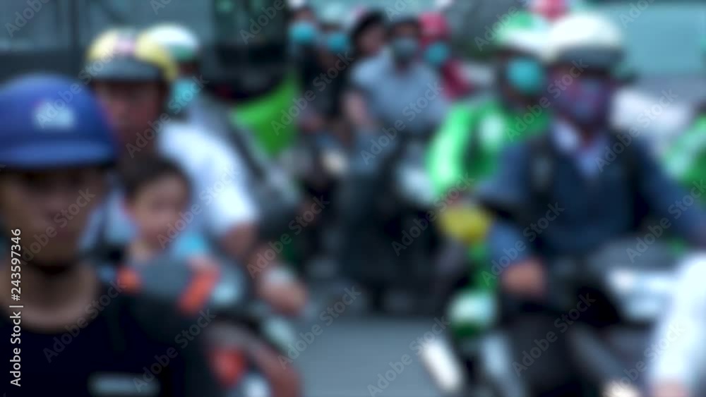 HO CHI MINH, VIETNAM - CIRCA NOVEMBER 2018 : View of HEAVY RUSH HOUR TRAFFIC in blurred. Many MOTORBIKE RIDERS on the busy road. HO CHI MINH, VIETNAM - CIRCA NOVEMBER 2018 : View of HEAVY RUSH HOUR TRAFFIC in blurred. Many MOTORBIKE RIDERS on the busy road.