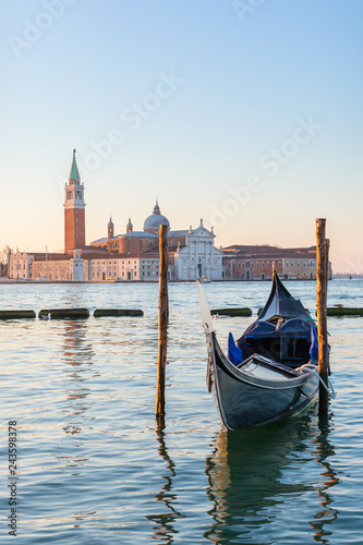 Venetian gondola with San Giorgio Maggiore church at background in Venice, Italy.