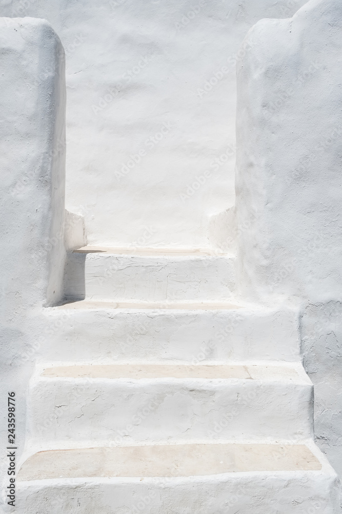 White painted stairs in a traditional Cycladic architecture style White painted stairs in a traditional Cycladic architecture style