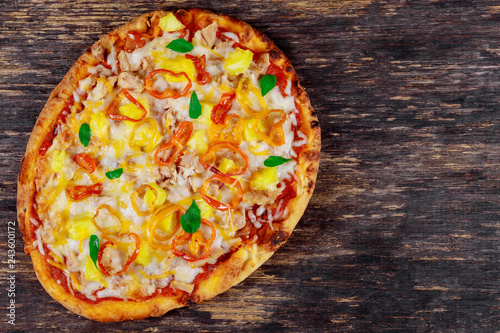 Pizza with corn, bacon, parmesan cheese and chicken