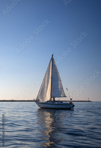 Sailboat leaving Channel Islands harbor on Gold Coast of California at Oxnard California United States © htrnr