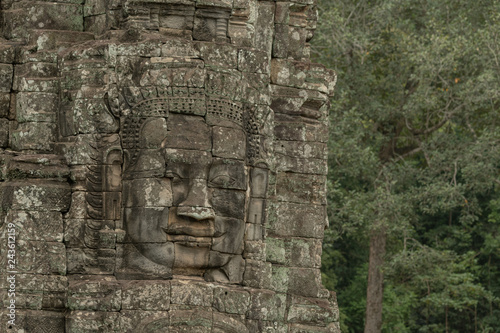 Frieze of Buddha face on Bayon wall © Nick Dale
