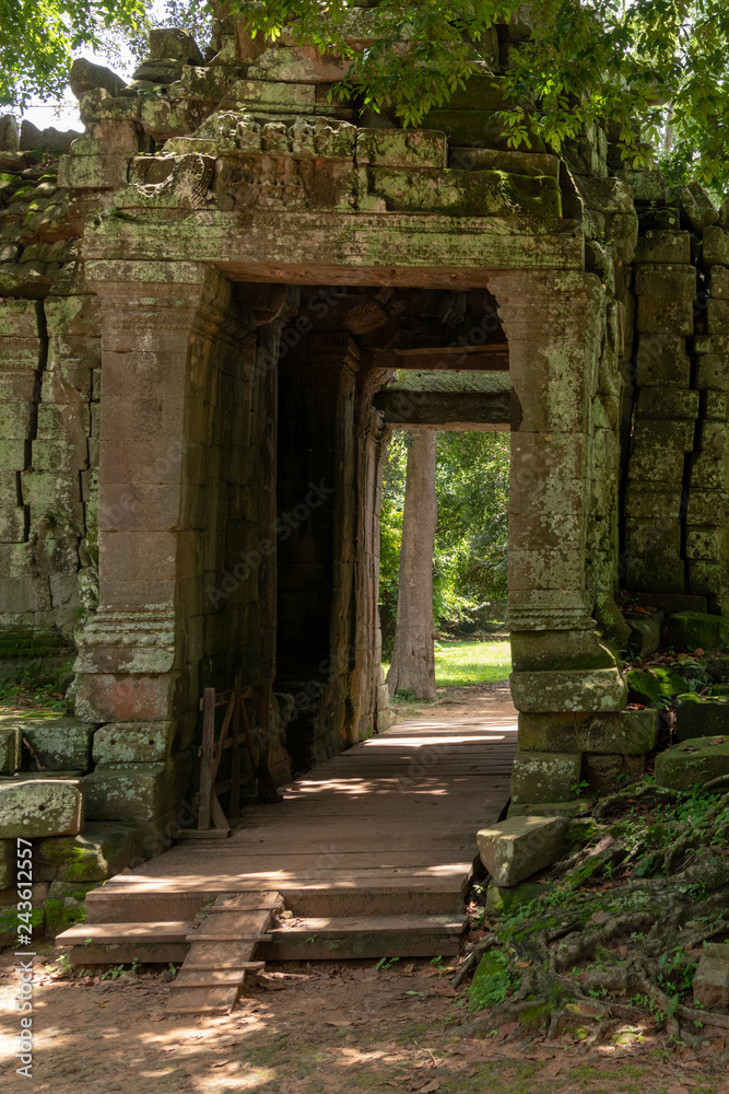 Ruined stone entrance in Banteay Kdei walls