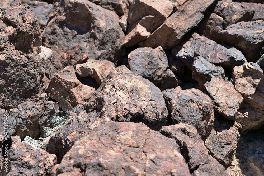 Pile of stones and boulders as texture and background