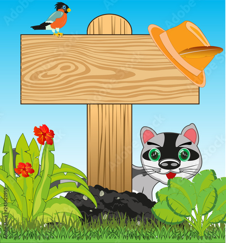 Wooden pole with board on year glade