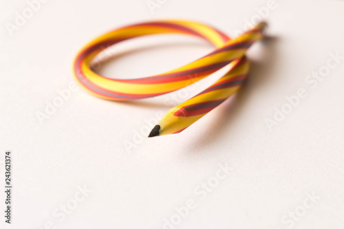 Flexible pencil . Isolated on white background. Bending pencil
