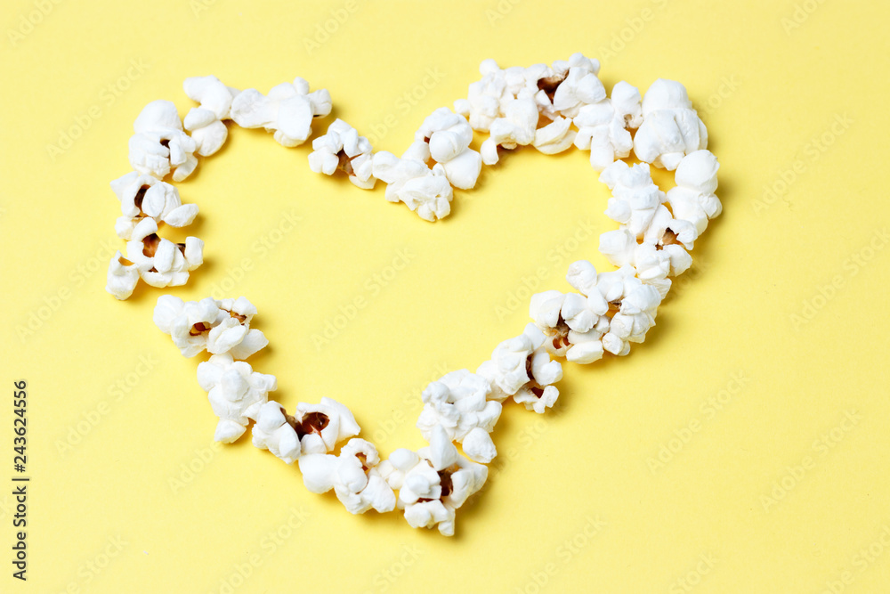 popcorn laid out in the shape of a heart close-up, top view