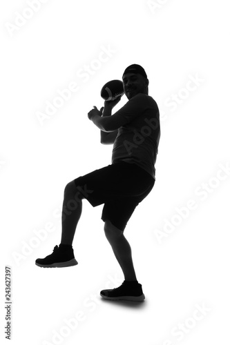 Silhouette of man with rugby ball on white background