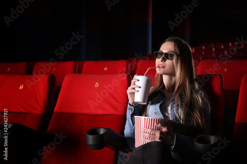 Young woman watching movie in cinema © Pixel-Shot