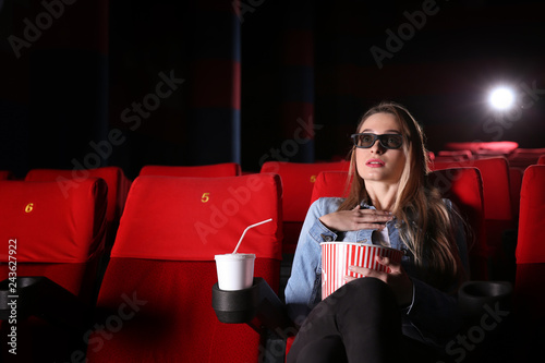 Young woman watching movie in cinema © Pixel-Shot