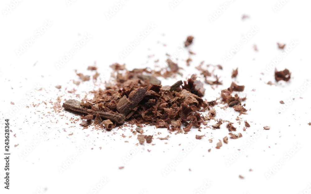 Cinnamon sticks with powder and shavings, macro isolated on white background Cinnamon sticks with powder and shavings, macro isolated on white background