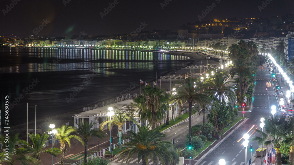 Night aerial panorama of Nice timelapse, France. Lighted Old Town little streets and waterfront
