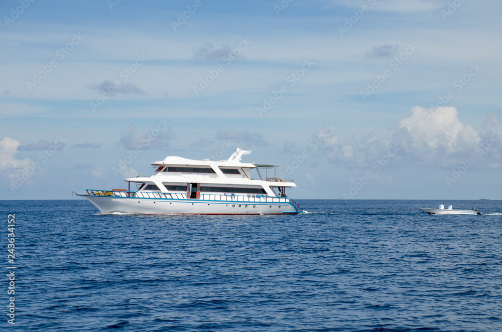 The boat in the open Indian Ocean the island of Maldives goes on waves The boat in the open Indian Ocean the island of Maldives goes on waves