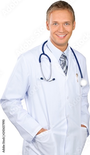 Young male physician standing