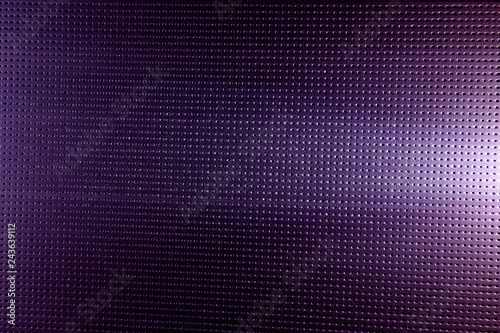 Purple background with black dots and white glow