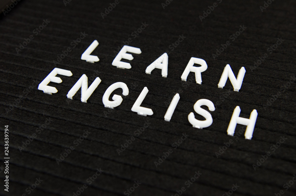 Fototapeta premium Learn English language, modern looking sign on black background