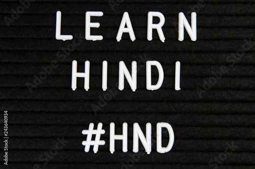 Learn Hindi, simple sign on black background, great for teachers, schools, students