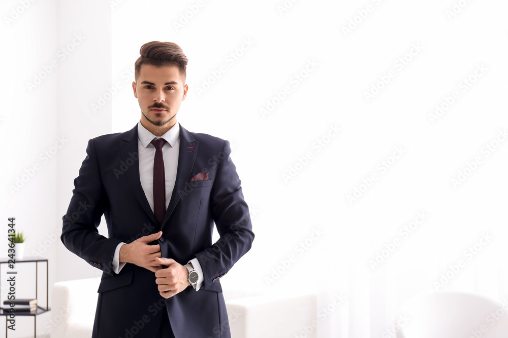 Stylish businessman at home