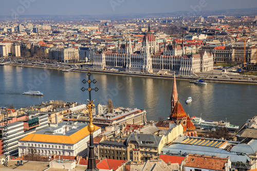 A landscape view of Budapest city in the evening, the Hungarian parliament building and otherr buildings along Danube river, Hungary