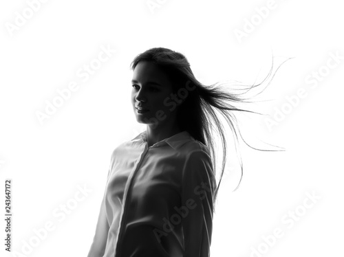 Silhouette of young woman o...