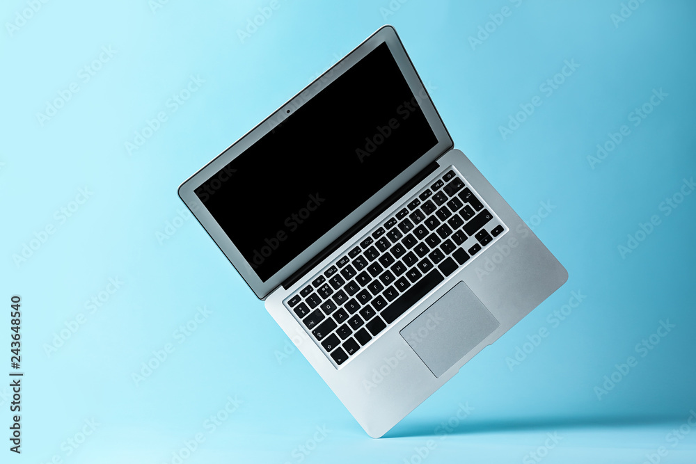 Modern laptop on color background Modern laptop on color background