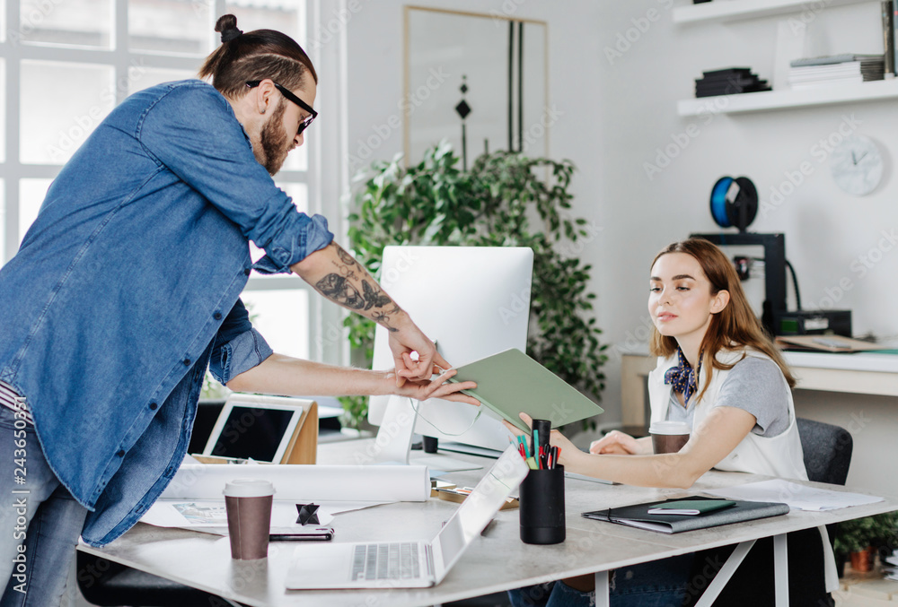 Graphic Designers Working Together at Office Graphic Designers Working Together at Office