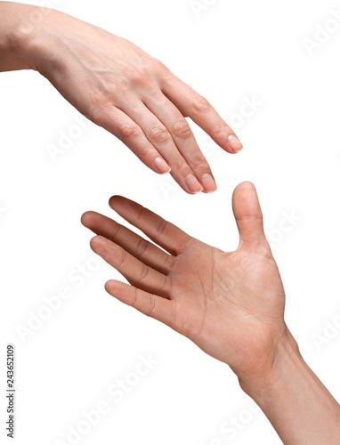 Hands reaching out and touching each other