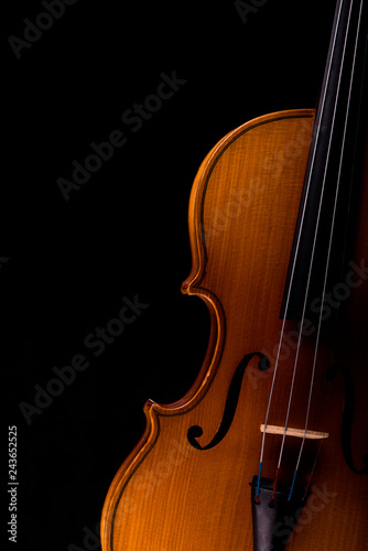 Violin music instrument closeup isolated on black