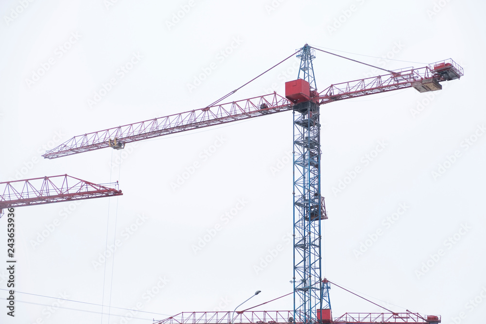 Red construction tower crane.