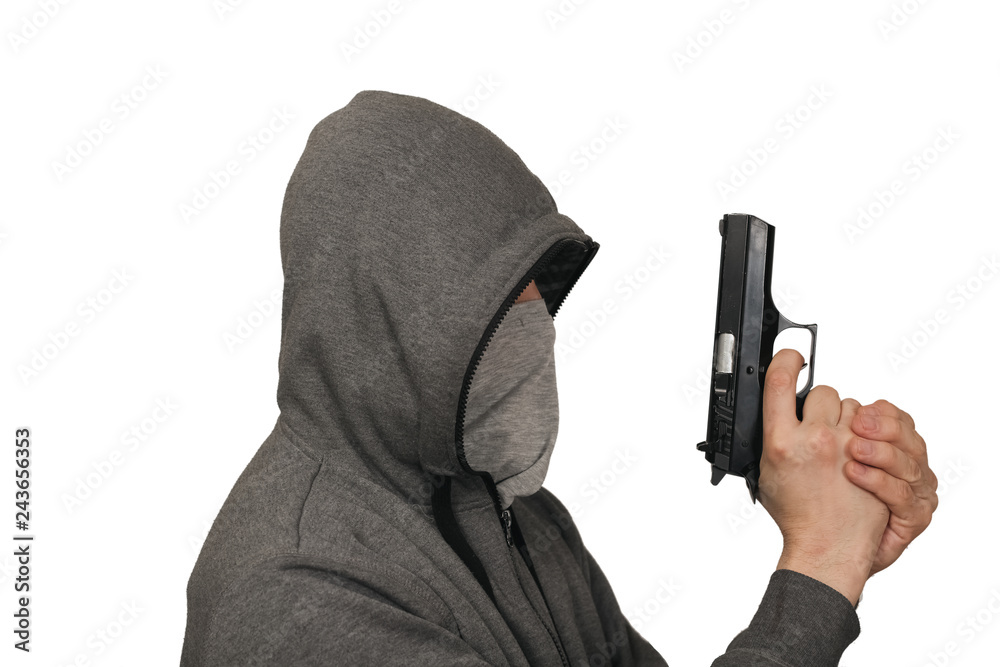 The man keeps a gun about the head in a mask. White background The man keeps a gun about the head in a mask. White background