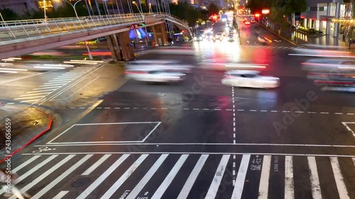 Time lapse traffic at the intersection in the night photo