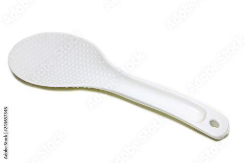 White plastic rice scoop spoon on white background