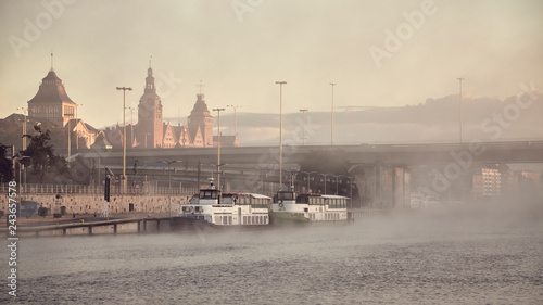 Szczecin City waterfront on foggy morning, color toning applied, Poland.