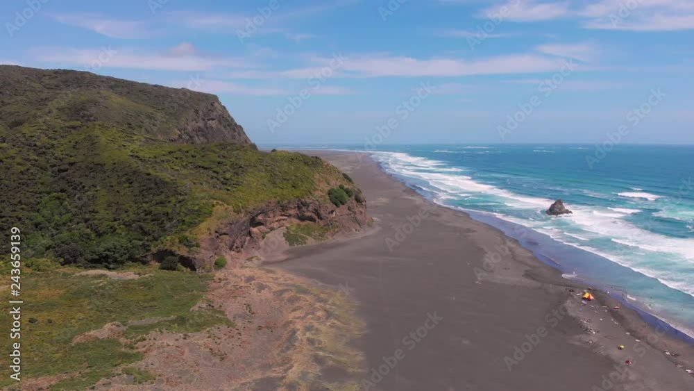 Aerial view of Karekare beach with the ocean and mountains Aerial view of Karekare beach with the ocean and mountains