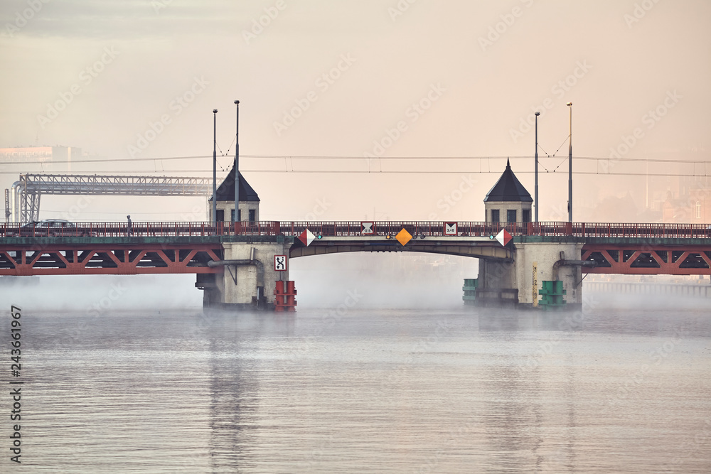 Fototapeta premium Long Bridge in Szczecin City at a foggy sunrise, Poland.