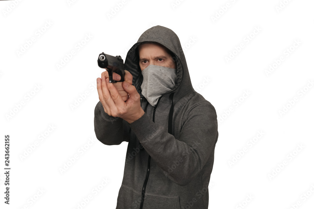 The man shoots with the gun. White background The man shoots with the gun. White background