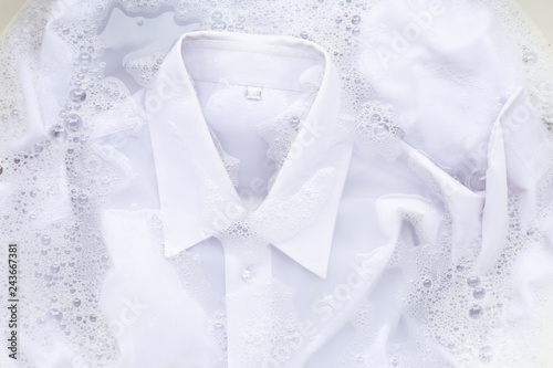 Soak cloth before washing, white shirt